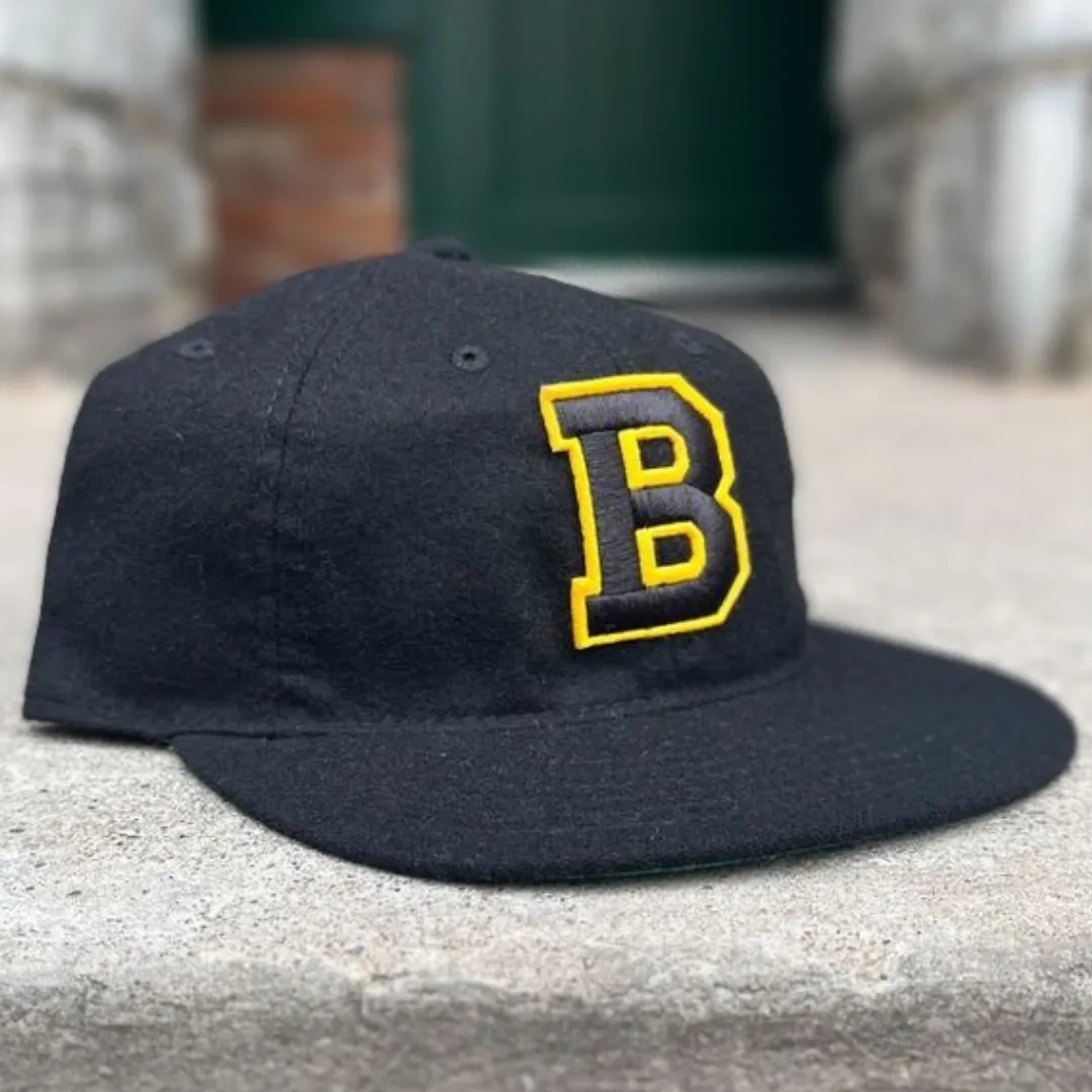 Here’s an optimized title for the product:

Boston Bruins Vintage Statesman Adjustable Cap – Classic Heritage Team Hat for Fans